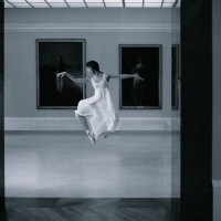 Ballerina in a jump in the Hall of Goya II