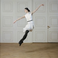 Ballerina in a jump in the Titian Hall