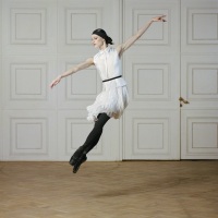 Ballerina in a jump in the Titian Hall