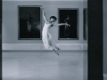 Ballerina in a jump in the Hall of Goya I